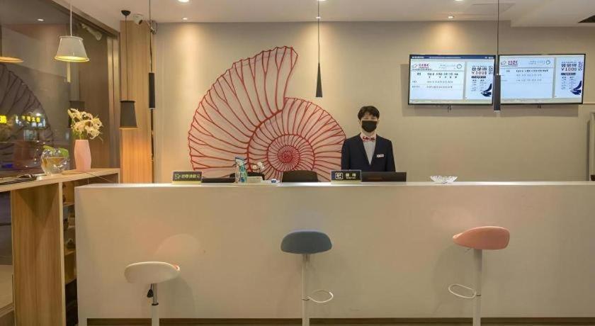 เชลล์ โฮเทล จ้าวจวง ซินฉางโร้ด ป้าต้ามาร์เก็ต Hotel Zaozhuang ภายนอก รูปภาพ