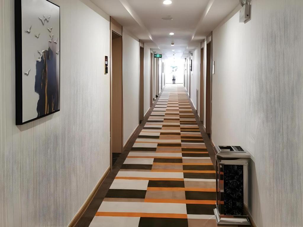 เชลล์ โฮเทล จ้าวจวง ซินฉางโร้ด ป้าต้ามาร์เก็ต Hotel Zaozhuang ภายนอก รูปภาพ