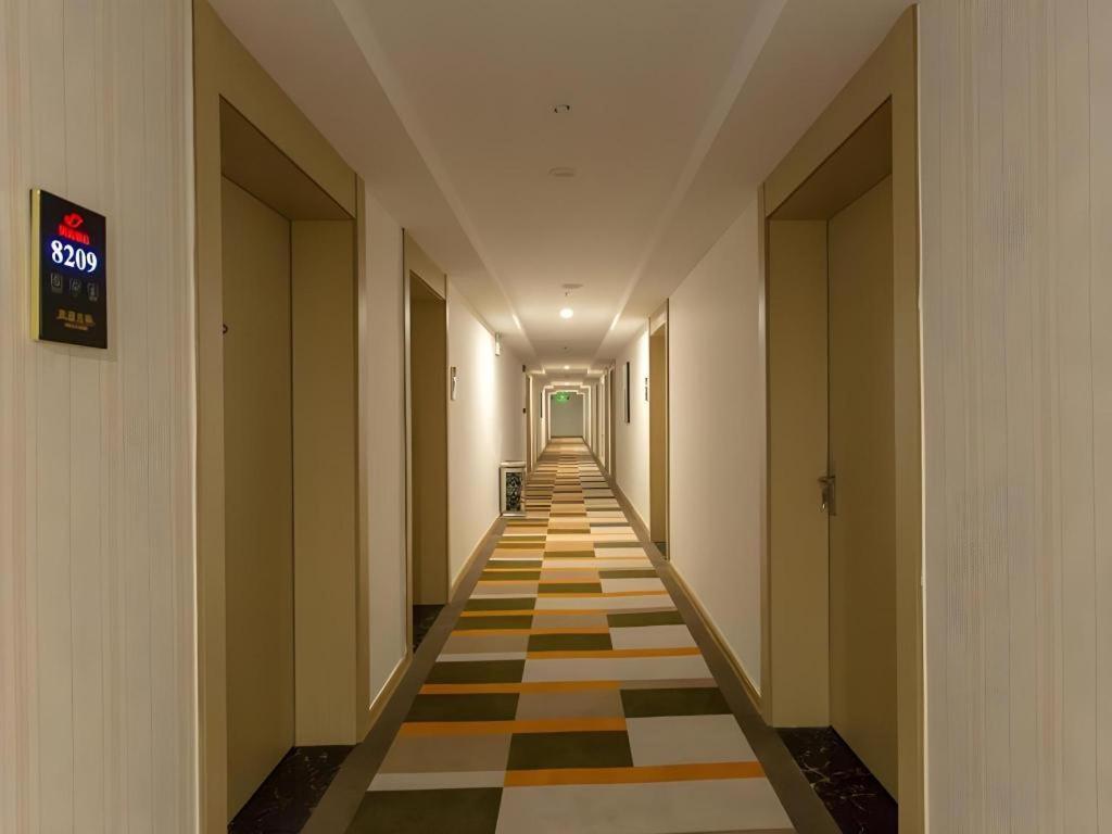 เชลล์ โฮเทล จ้าวจวง ซินฉางโร้ด ป้าต้ามาร์เก็ต Hotel Zaozhuang ภายนอก รูปภาพ