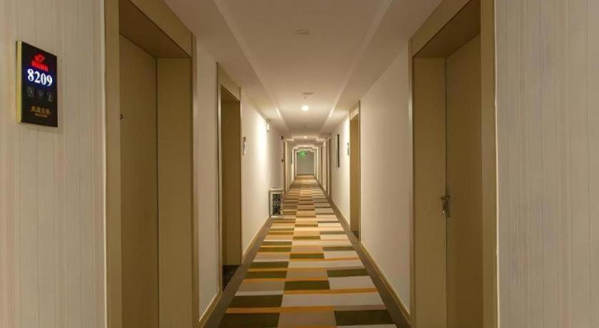 เชลล์ โฮเทล จ้าวจวง ซินฉางโร้ด ป้าต้ามาร์เก็ต Hotel Zaozhuang ภายนอก รูปภาพ